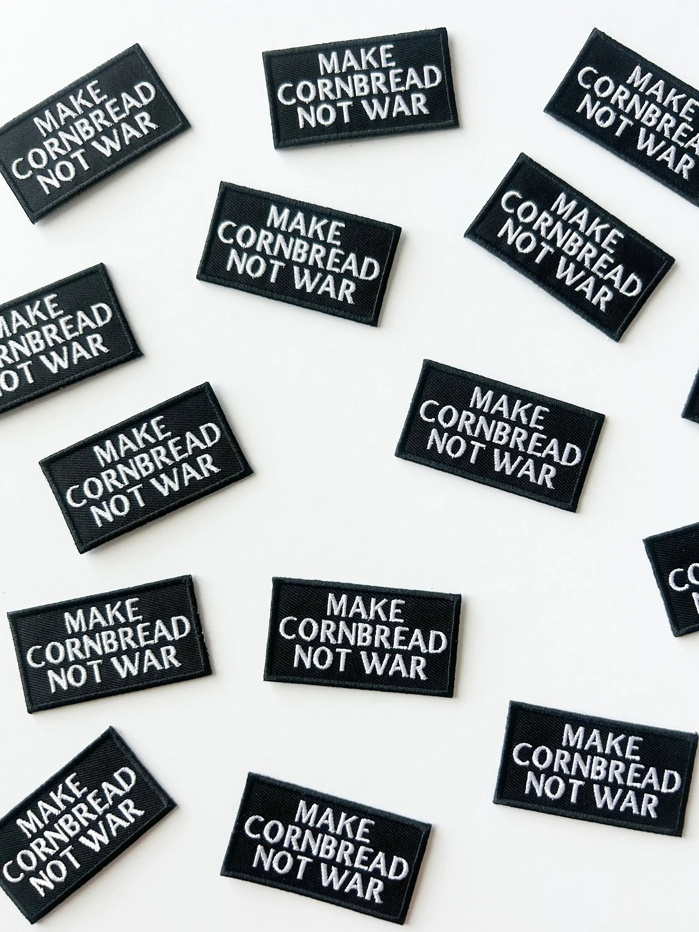 Embroidered "Make Cornbread Not War" Black Iron-on Patch